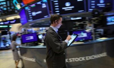 Wall Street gains, dollar climbs on solid data, debt ceiling progress
