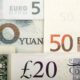 Analysis-Global pension funds eye currencies for additional returns